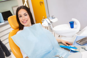 woman happy with dental care holistic dentistry concept