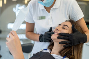 woman happy with dental care